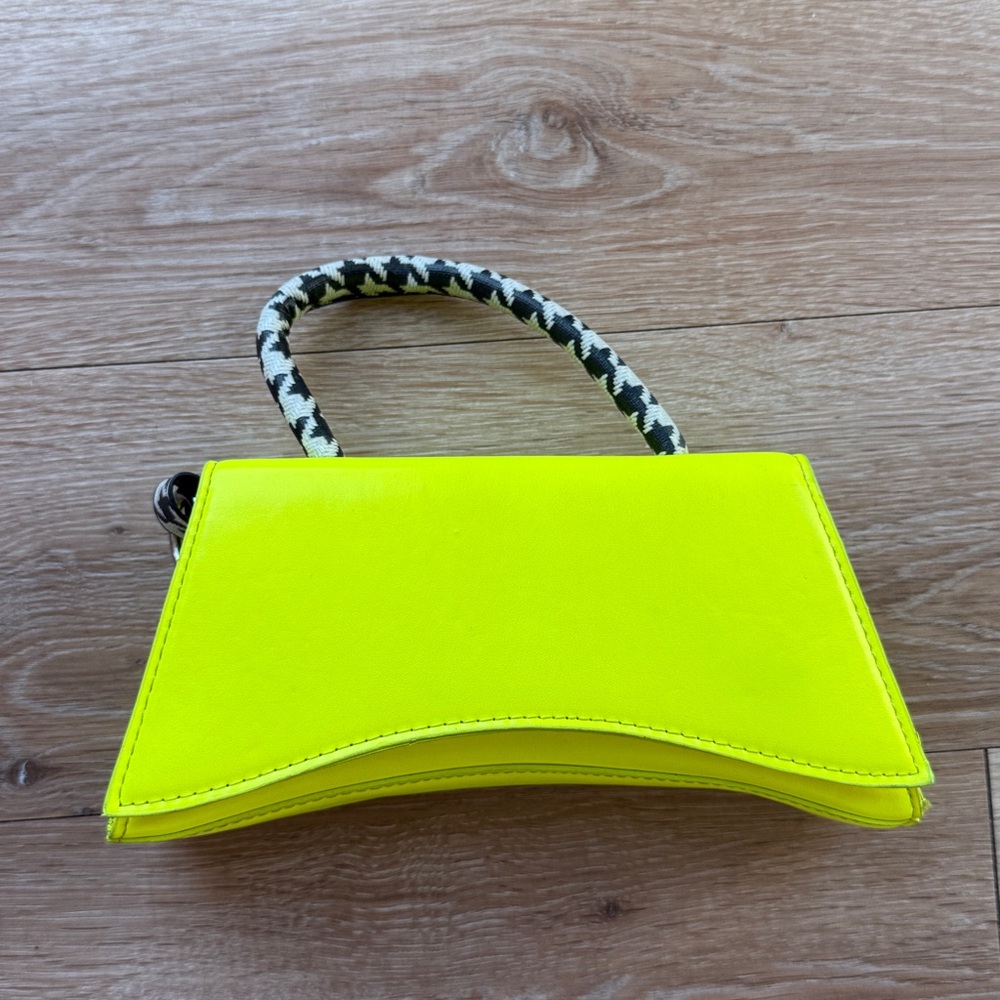 Vibrant Yellow Handbag with Patterned Handle